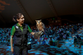 Cargar la imagen en la vista de la galería, Keeper holding an owl before the audience at the Creature of the Night show