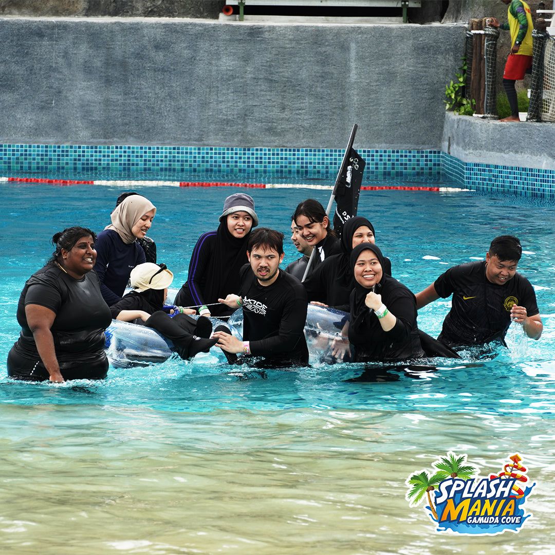 A group posing on a float in the shallow end of a pool.