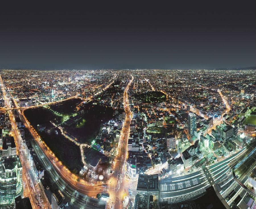 Osaka lit up at night, seen from 300 metres