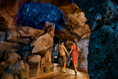 Cargar la imagen en la vista de la galería, Couple walking through Naracoorte Cave on the Wallaby Trail
