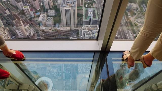 Looking straight down at the city through the observatory glass floor